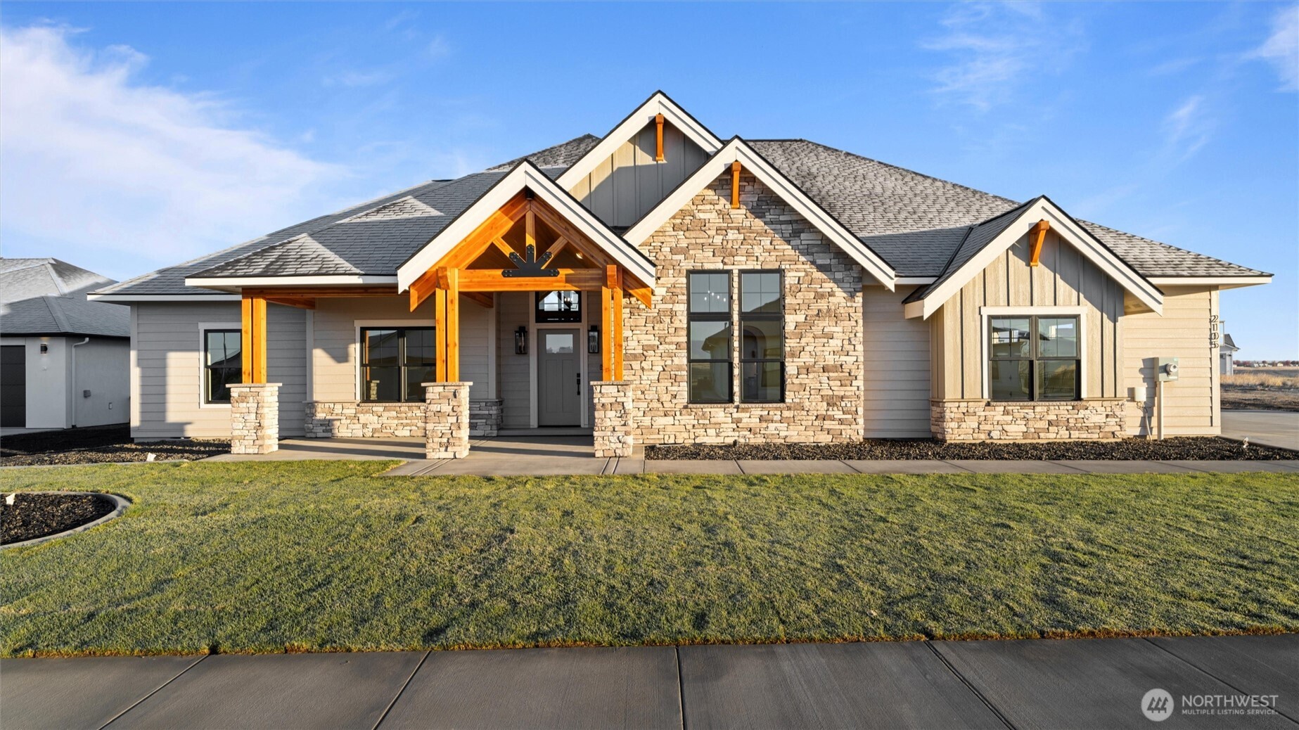511 Southwest 12th Street College Place, WA 99324 - Photo 2 of 21 a front view of a house with a yard