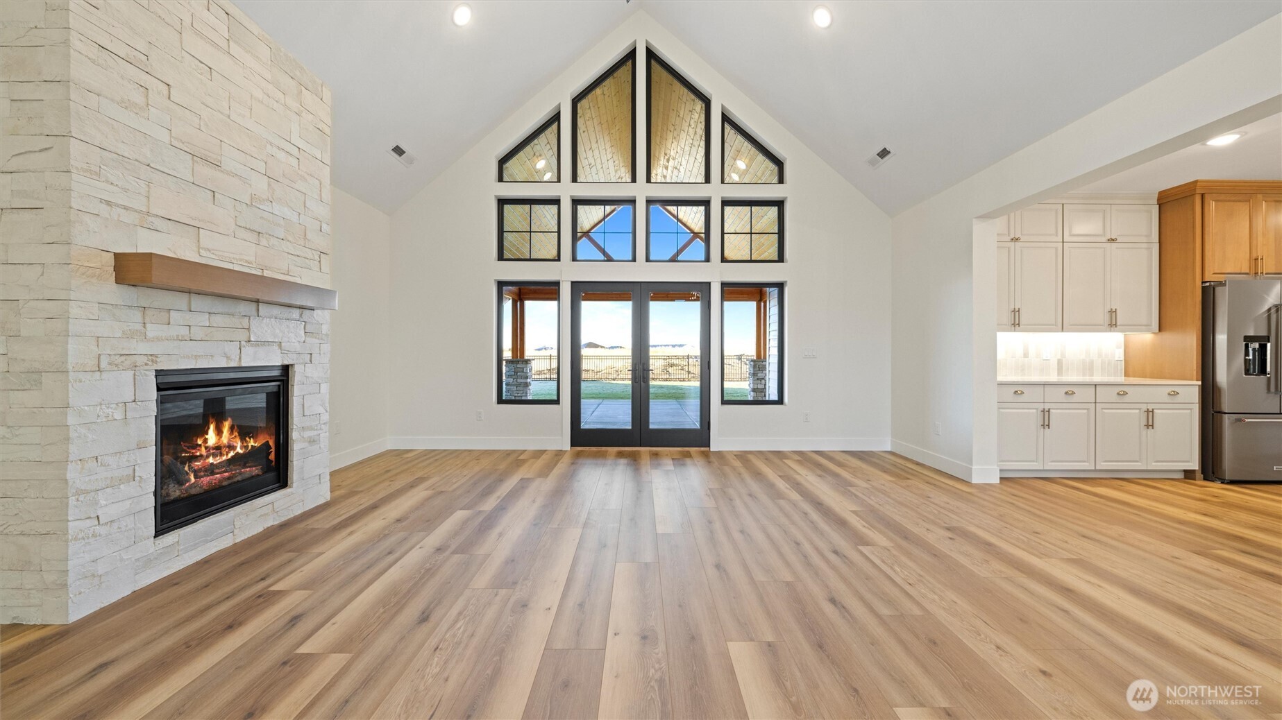 511 Southwest 12th Street College Place, WA 99324 - Photo 3 of 21 a view of empty room with wooden floor and fireplace
