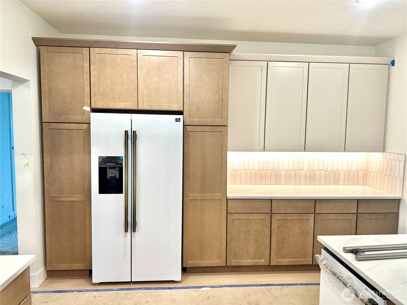 511 Southwest 12th Street College Place, WA 99324 - Photo 8 of 31 a kitchen with stainless steel appliances granite countertop a refrigerator and a sink