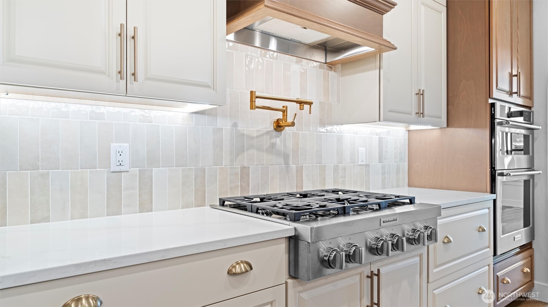 511 Southwest 12th Street College Place, WA 99324 - Photo 10 of 21 a kitchen with a stove and a refrigerator
