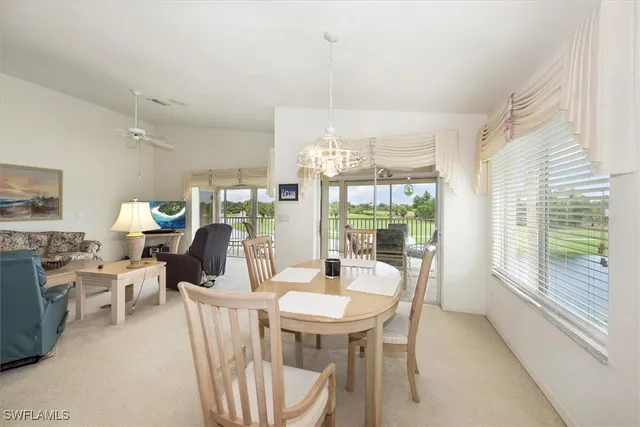 a kitchen with sink cabinets and window