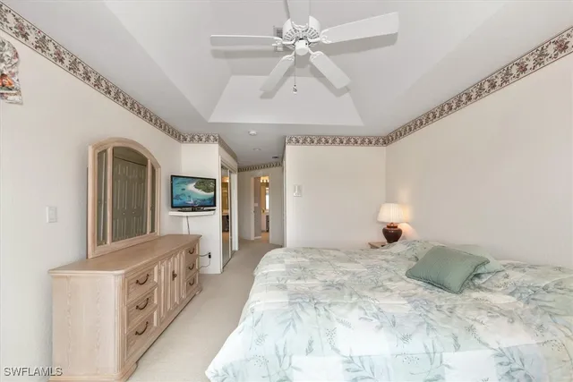 a view of a double vanity sink mirror and a toilet