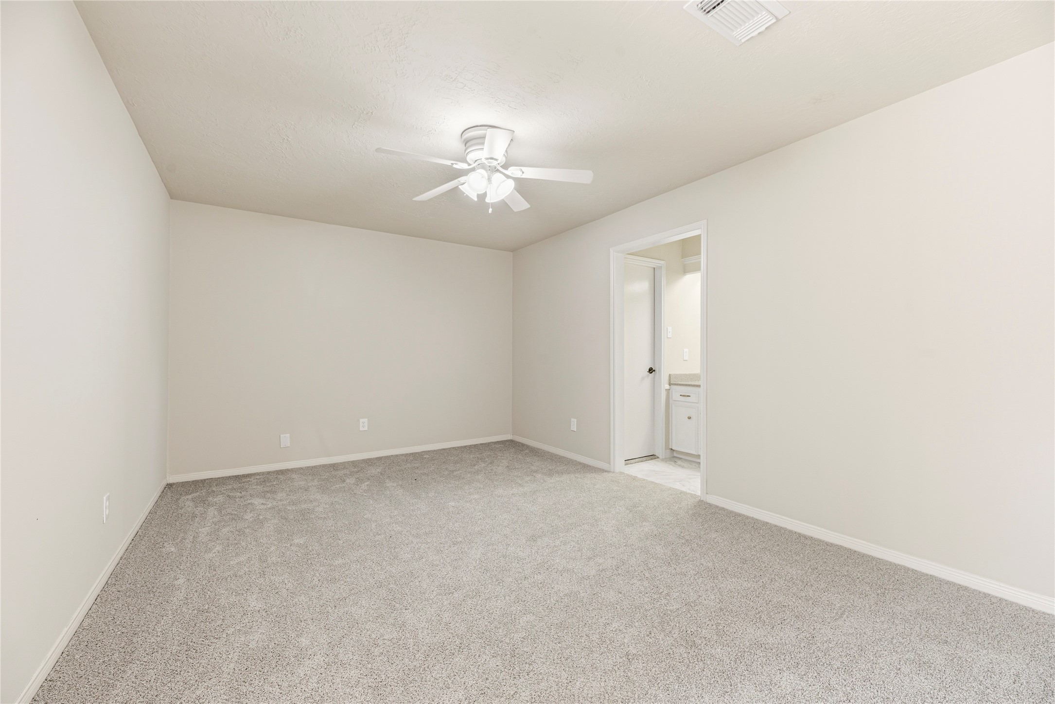 6931 Sandy Knolls Drive Spring, TX 77379 - Photo 14 of 21 Awe, the primary bedroom with walk-in closet, en-suite bathroom w access to your covered patio to creates an inviting space to relax at the end of the day
**6931 Sandy Knolls Dr., Spring, TX 77379**