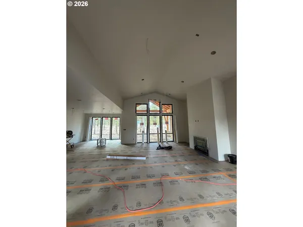 a view of a livingroom with wooden floor