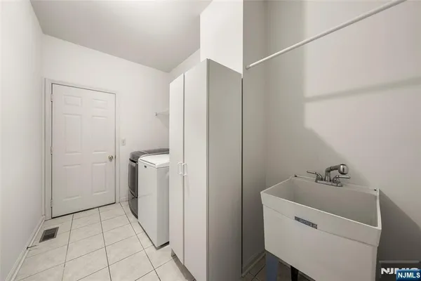 a bathroom with a sink and toilet