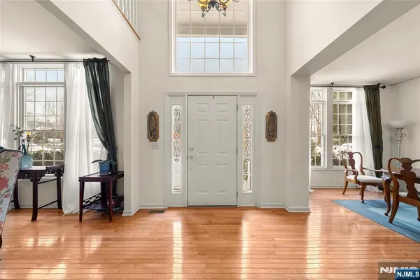 a view of livingroom with furniture wooden floor and windows