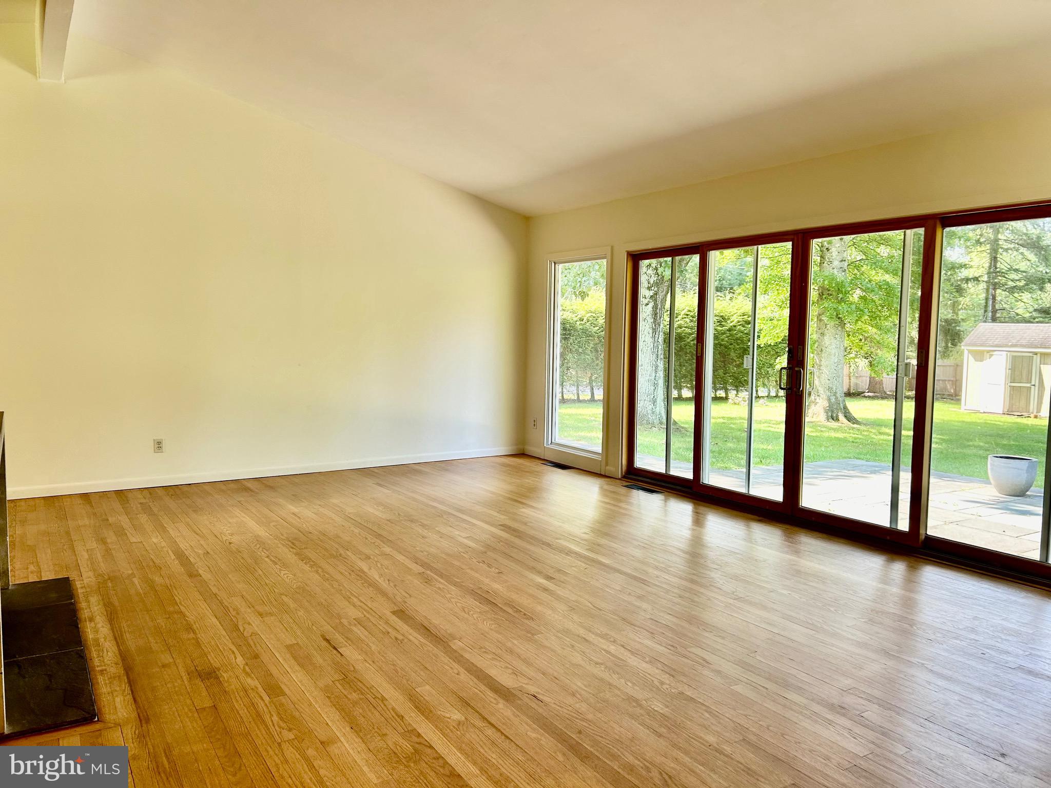 28 Pardoe Road Princeton, NJ 08540 - Photo 5 of 18 Livingroom-cathedral ceiling & entire wall sliders