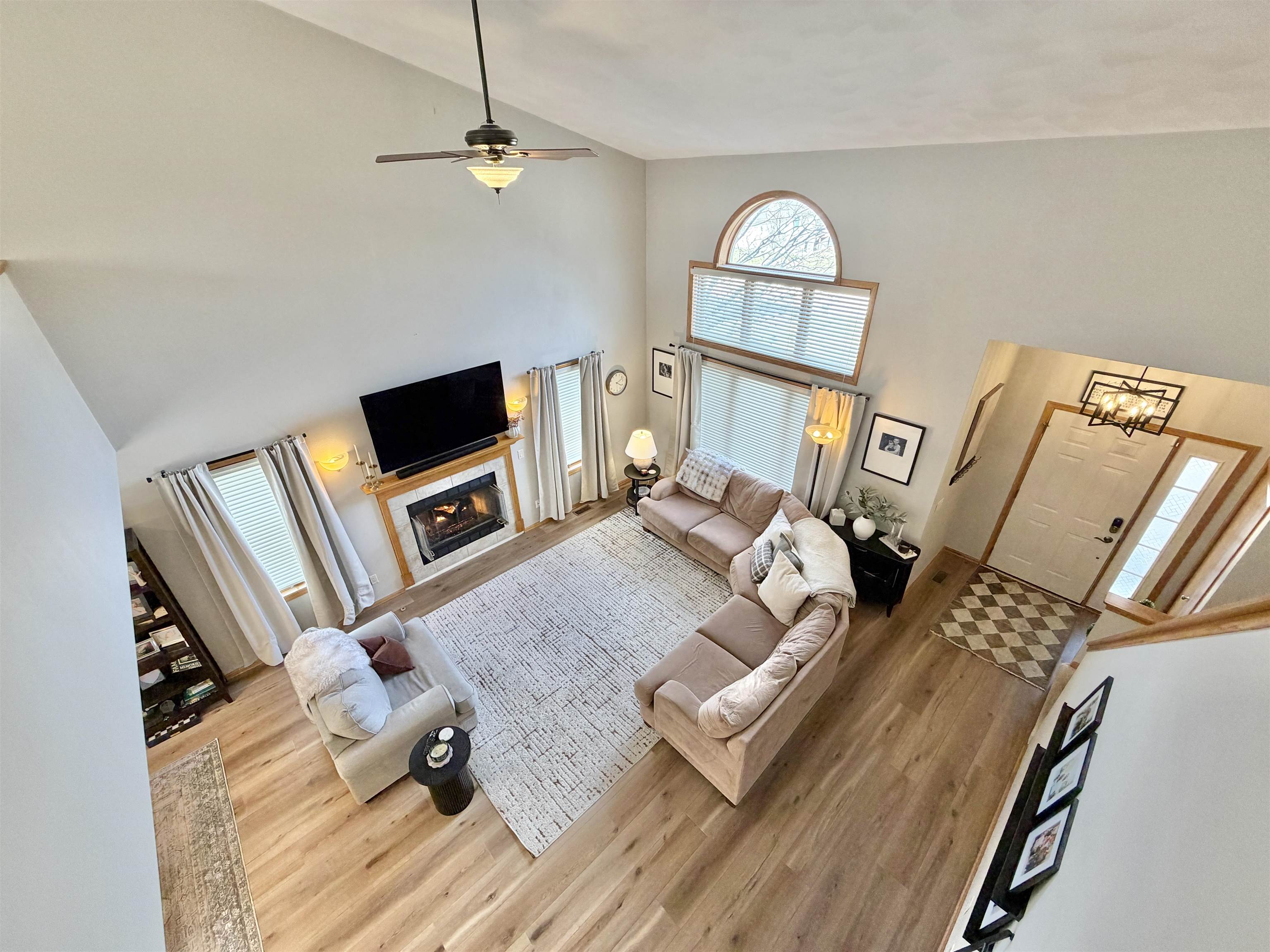 9102 River View Trail Roscoe, IL 61073 - Photo 15 of 40 a living room with furniture rug and a window
