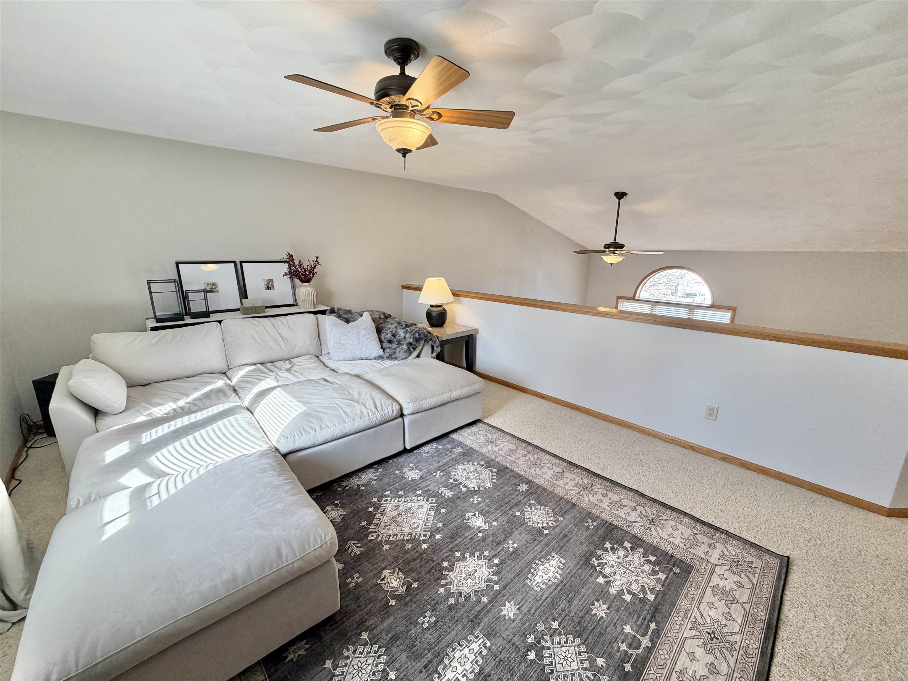 9102 River View Trail Roscoe, IL 61073 - Photo 16 of 40 a bedroom with a bed and lamp