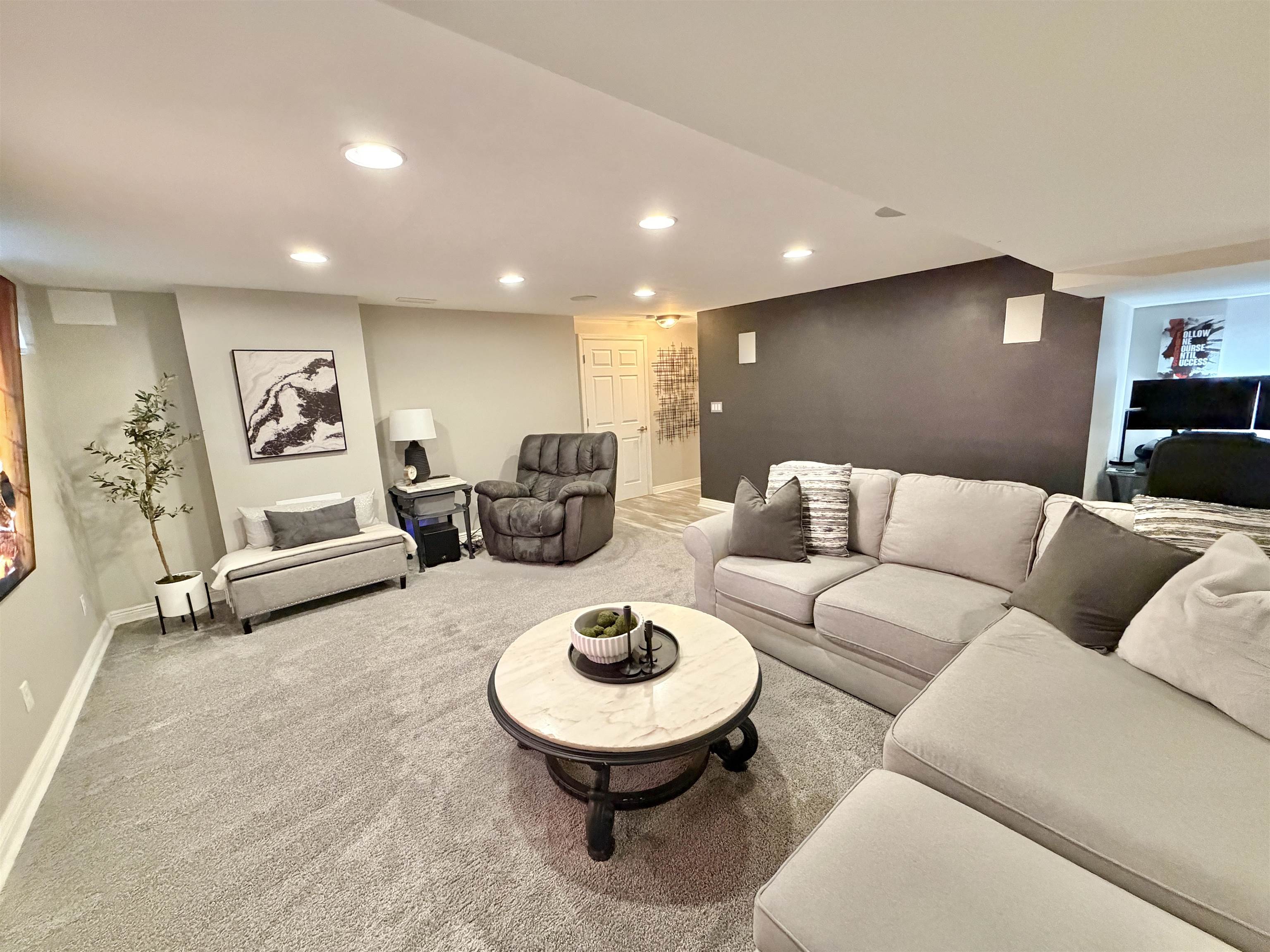 9102 River View Trail Roscoe, IL 61073 - Photo 29 of 40 a living room with furniture a couch and a large window