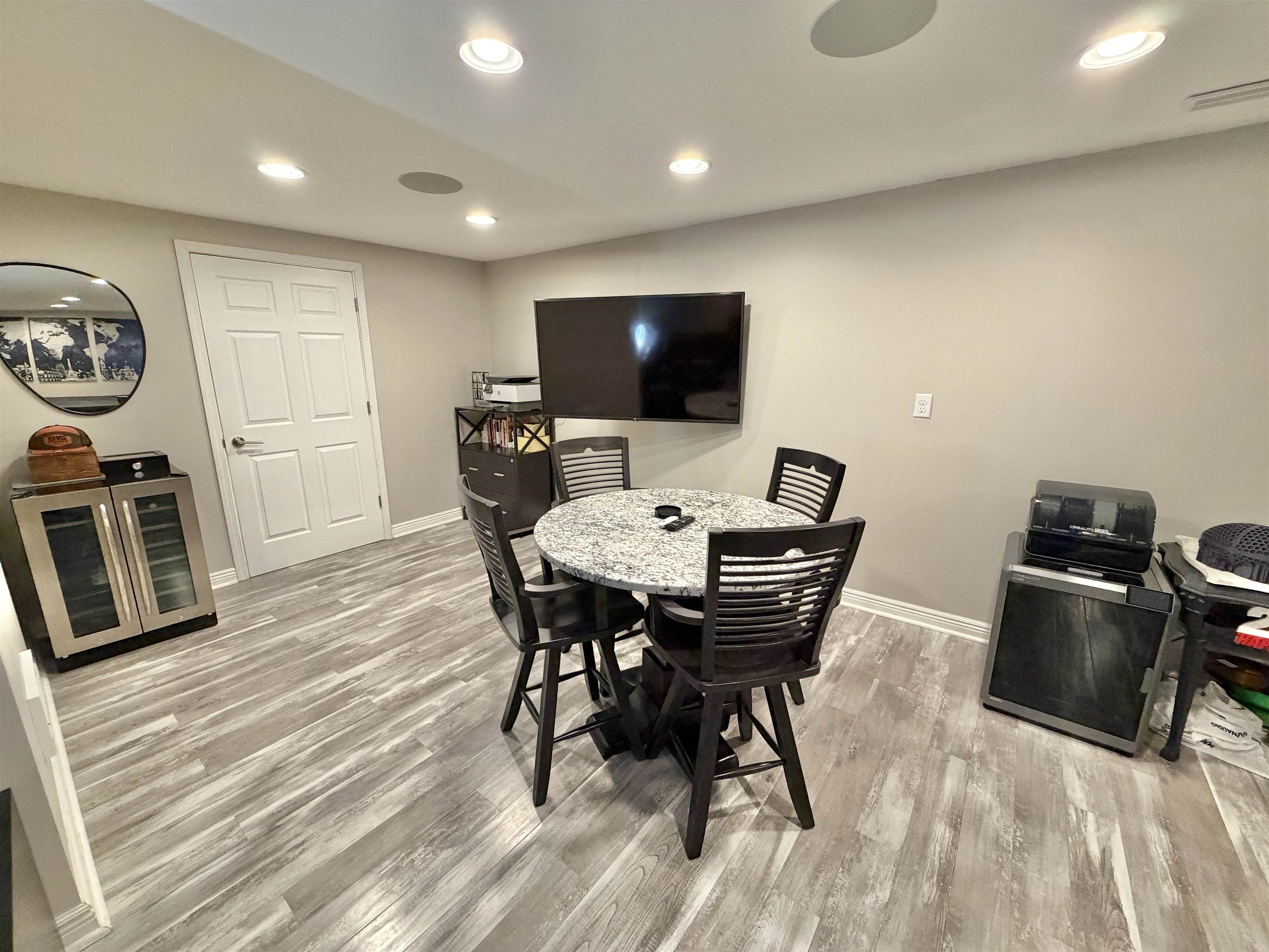 9102 River View Trail Roscoe, IL 61073 - Photo 31 of 40 a view of a dining room with furniture window and wooden floor