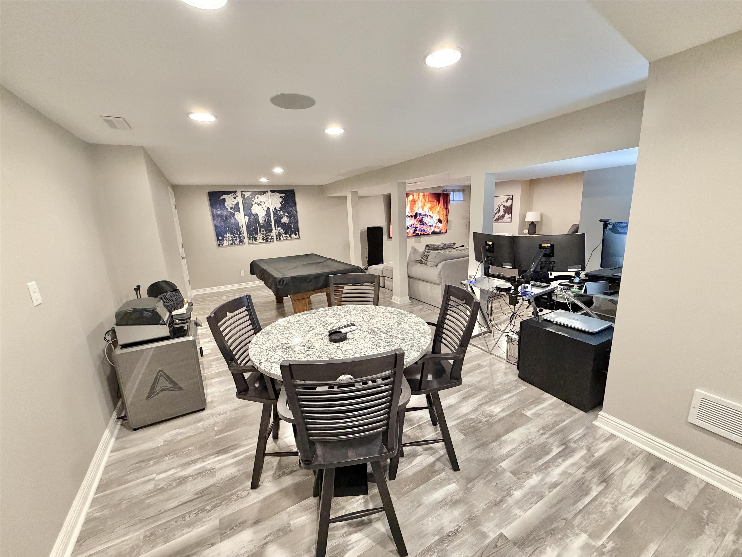 9102 River View Trail Roscoe, IL 61073 - Photo 32 of 40 a view of a dining room with furniture