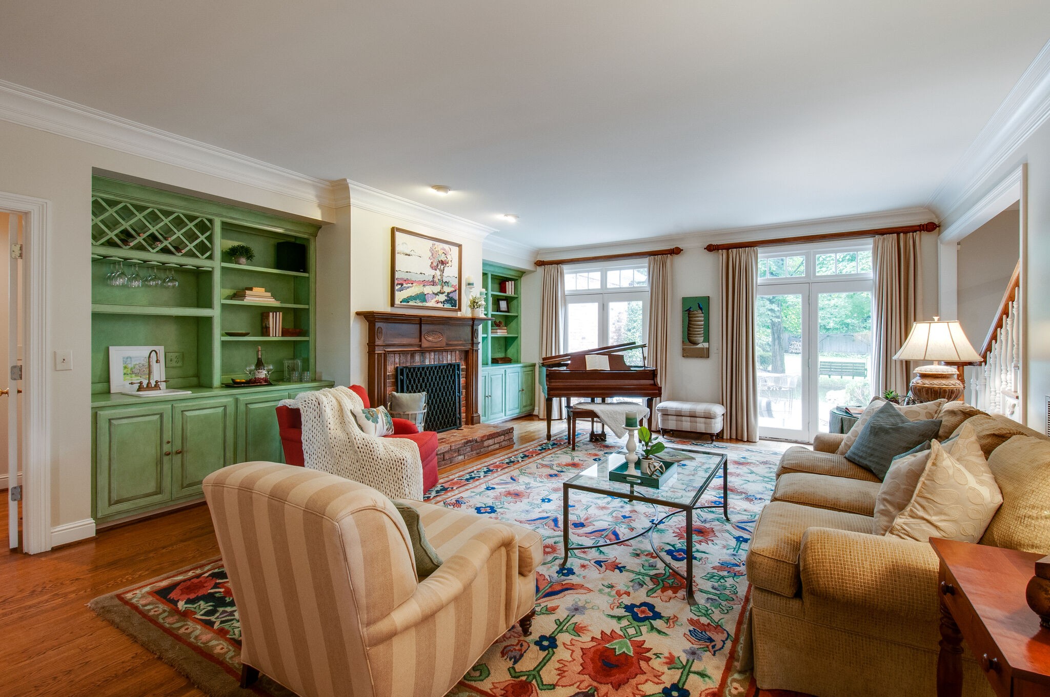 4009 Sneed Road Nashville, TN 37215 - Photo 8 of 37 a living room with furniture a fireplace and a large window