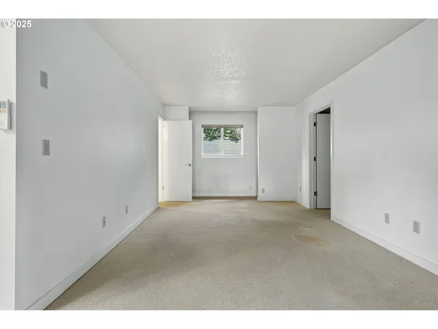 a view of an empty room with window