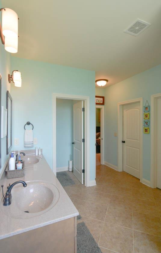 2590 Gunn Road Adams, TN 37010 - Photo 14 of 30 a bathroom with a sink and a mirror
