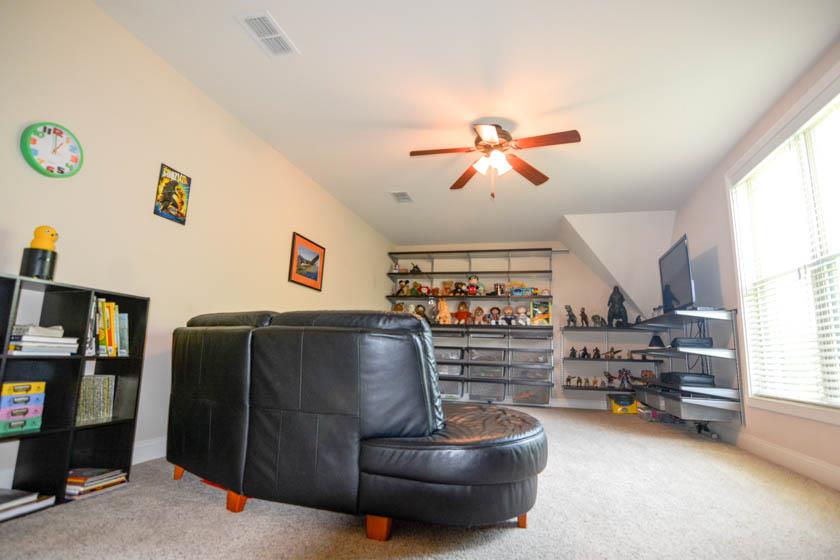2590 Gunn Road Adams, TN 37010 - Photo 19 of 30 a living room with furniture and a flat screen tv