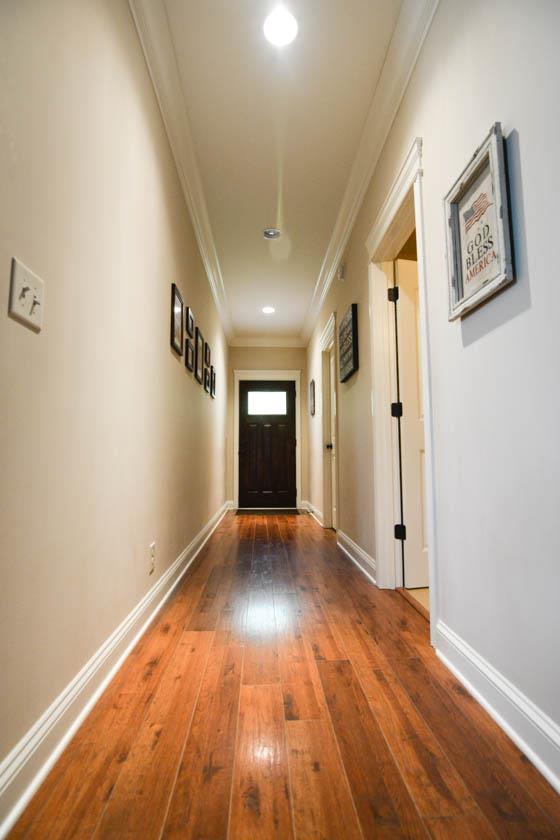 2590 Gunn Road Adams, TN 37010 - Photo 6 of 30 a view of an empty room with wooden floor and a window