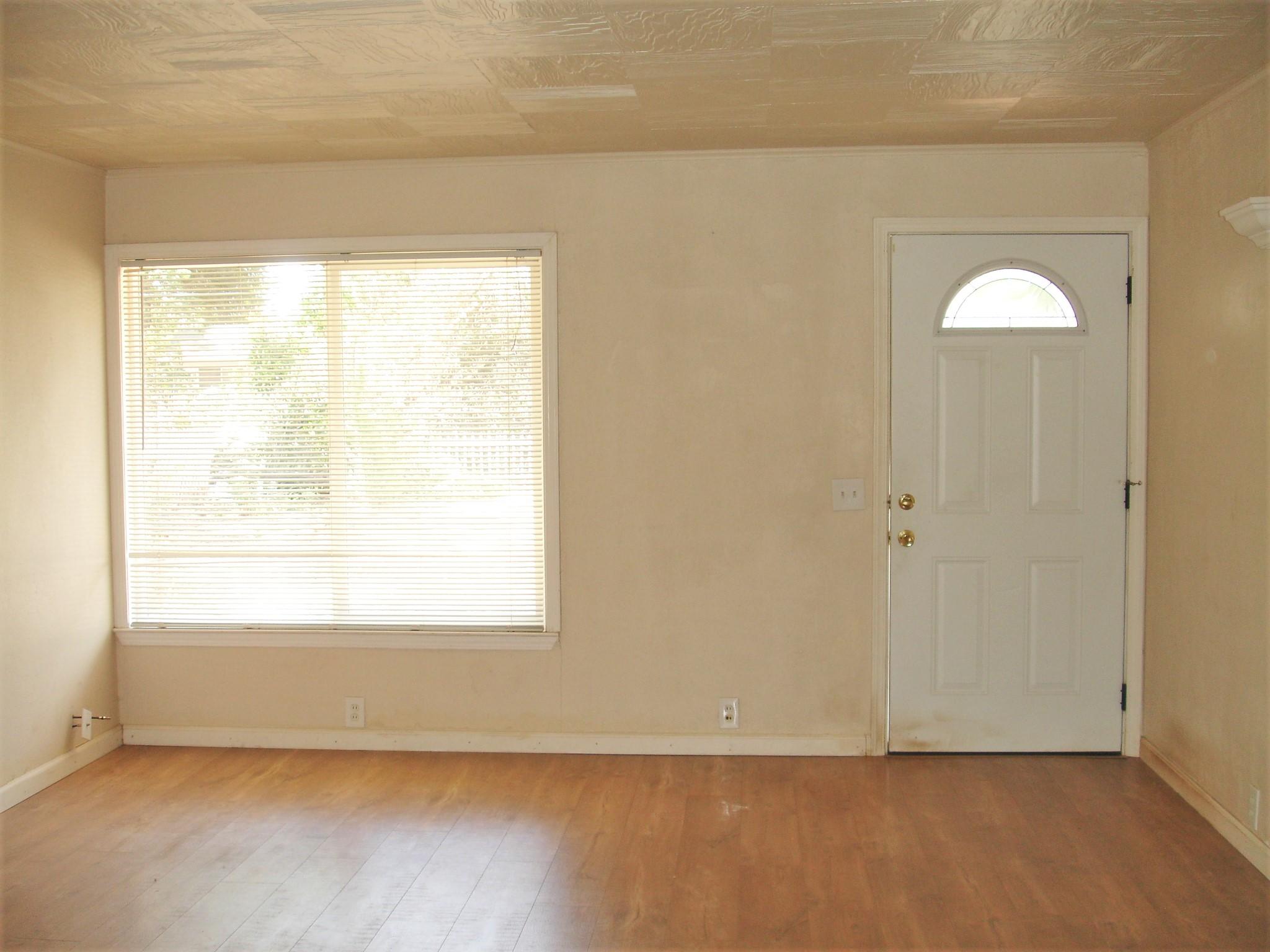 1146 Echo Road Redding, CA 96002 - Photo 2 of 36 an empty room with a window