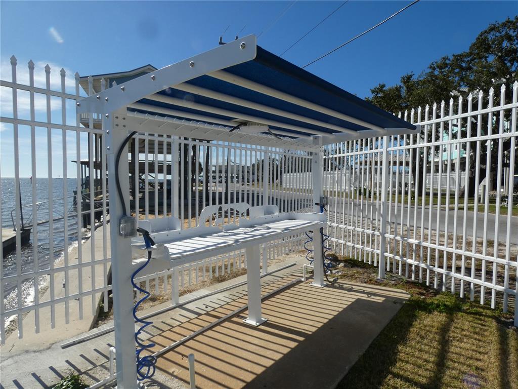 502 Main Street, Unit 106 Horseshoe Beach, FL 32648 - Photo 27 of 27 a view of balcony and wooden floor
