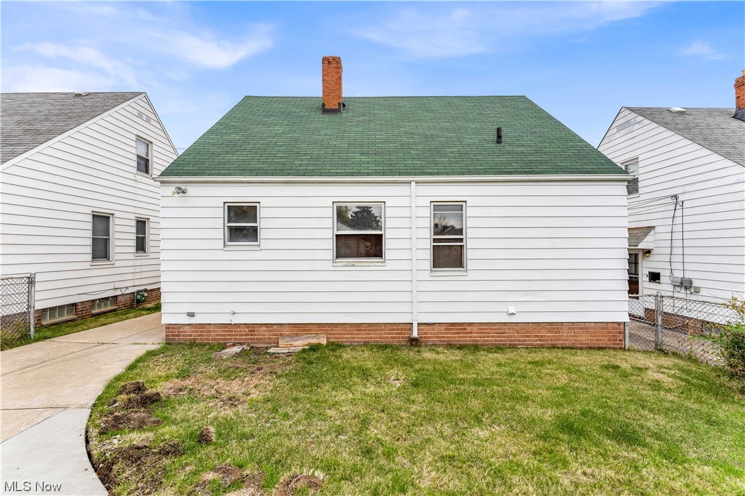 5384 Turney Road Cleveland, OH 44125 - Photo 27 of 27 Rear view of house with a lawn