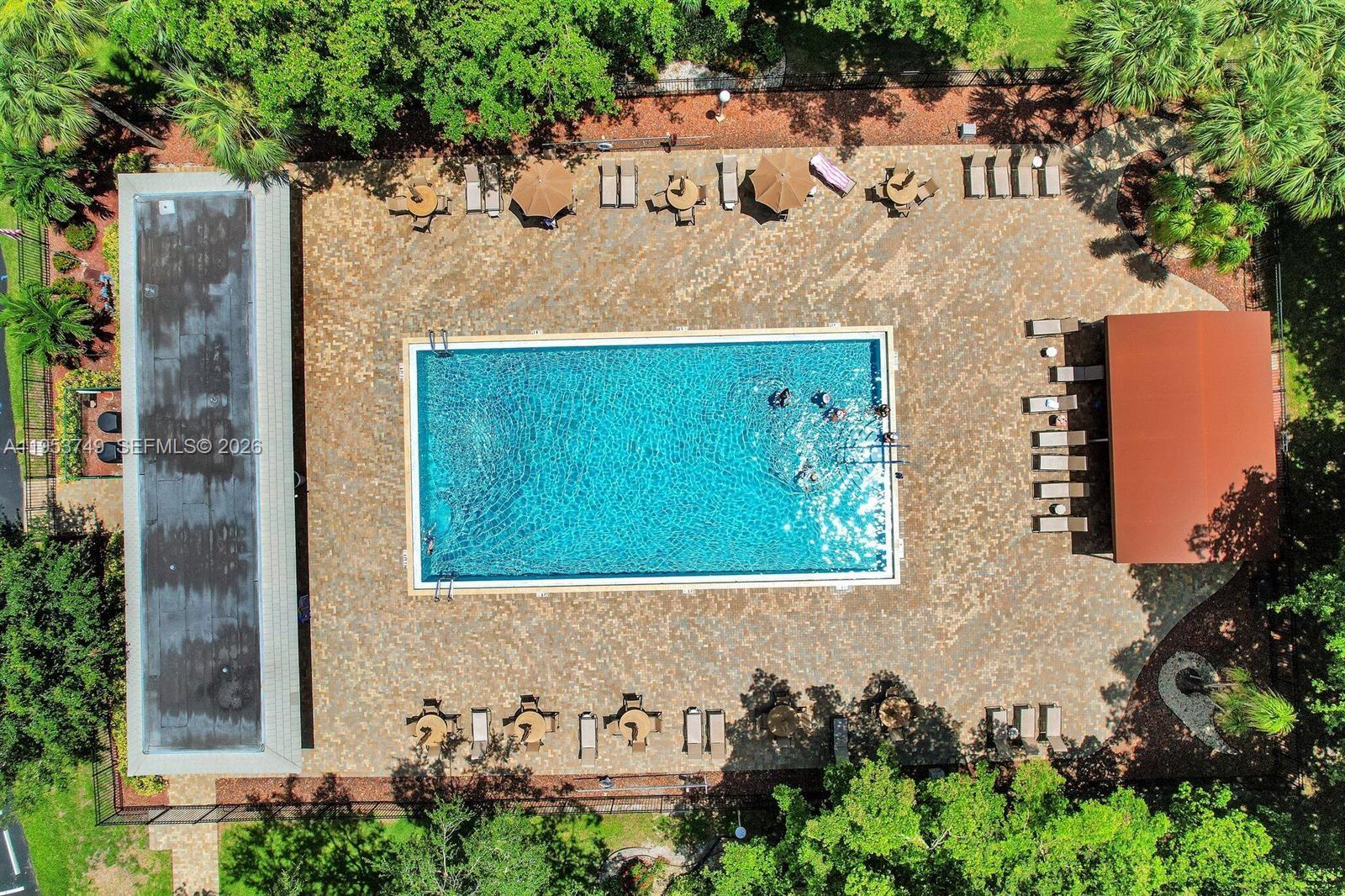 2004 Granada Drive, Unit O2 Coconut Creek, FL 33066 - Photo 20 of 26 an aerial view of a house with yard