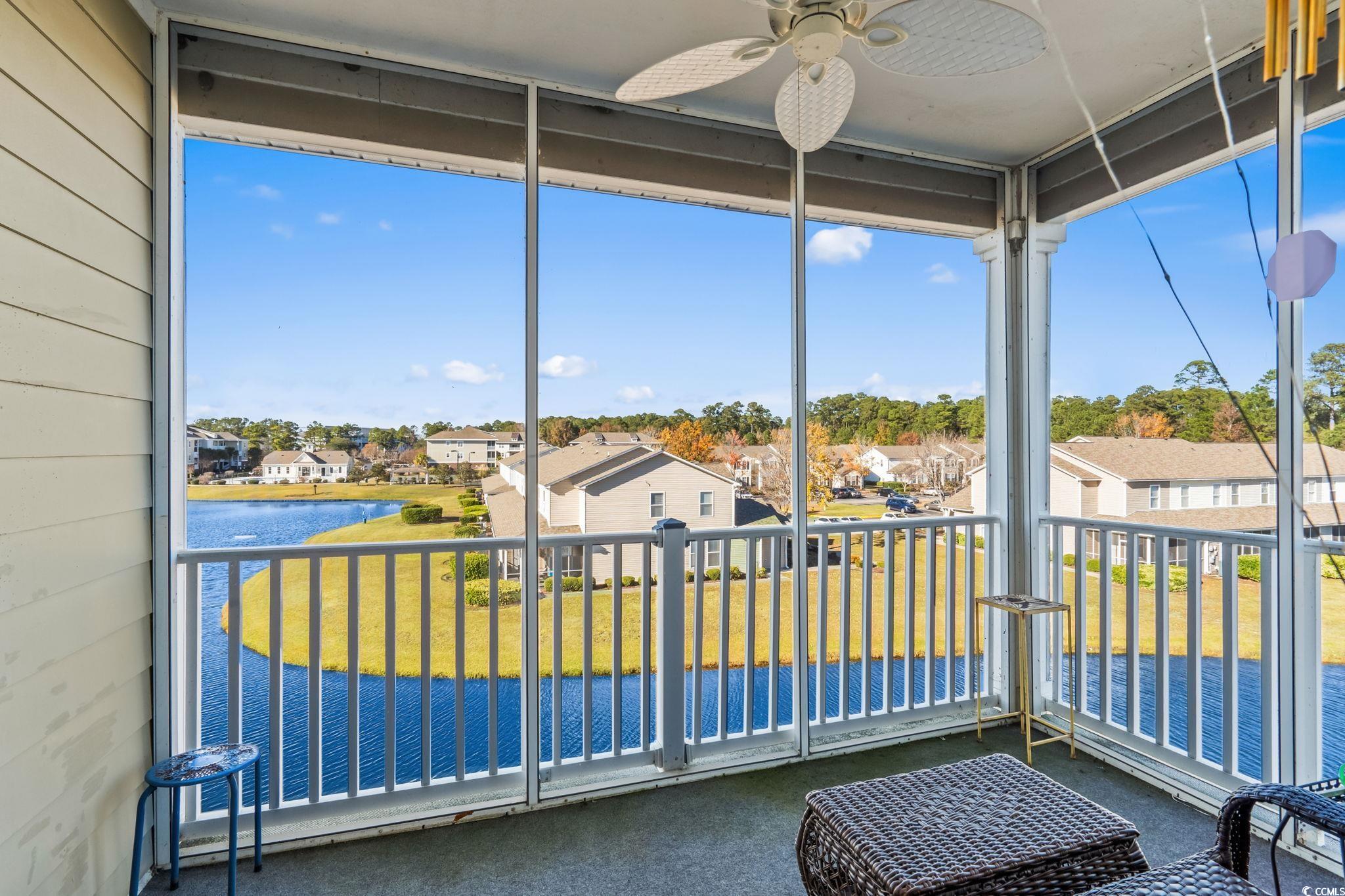 336 Kiskadee Loop, Unit 19O Conway, SC 29526 - Photo 23 of 26 Sunroom featuring a residential view and a water view