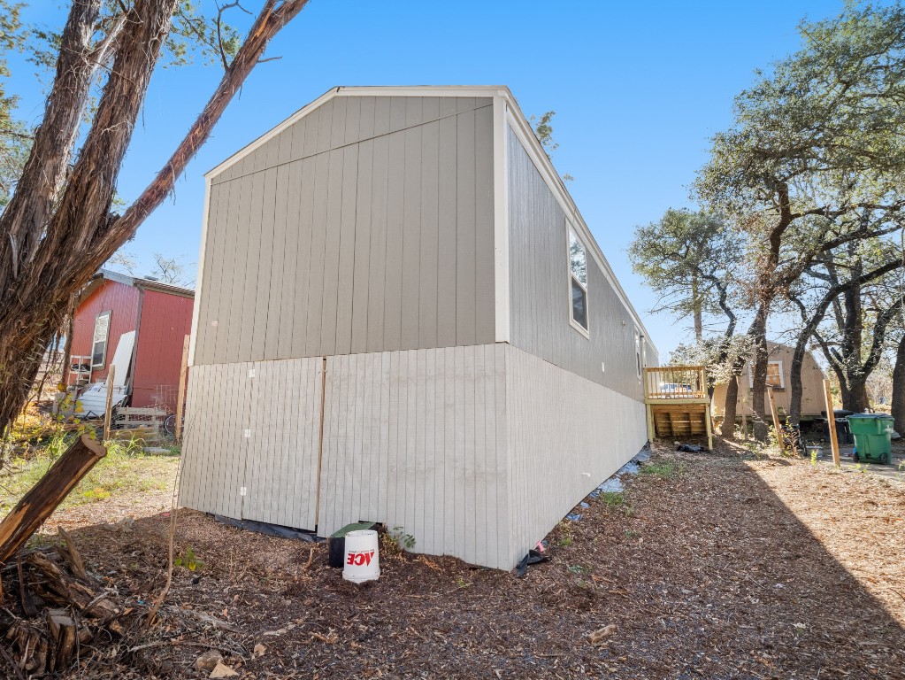 7214 Comstock Cove Lago Vista, TX 78645 - Photo 20 of 20 a view of a back yard of the house
