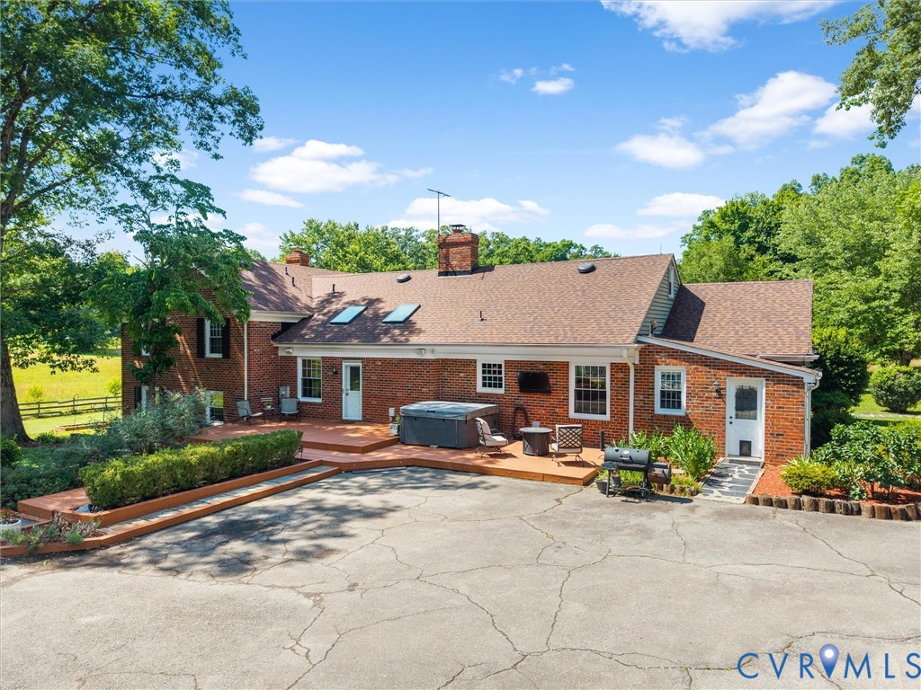 13099 Cedon Road Ashland, VA 23005 - Photo 62 of 92 Back deck has charming mature landscaping, a hot t