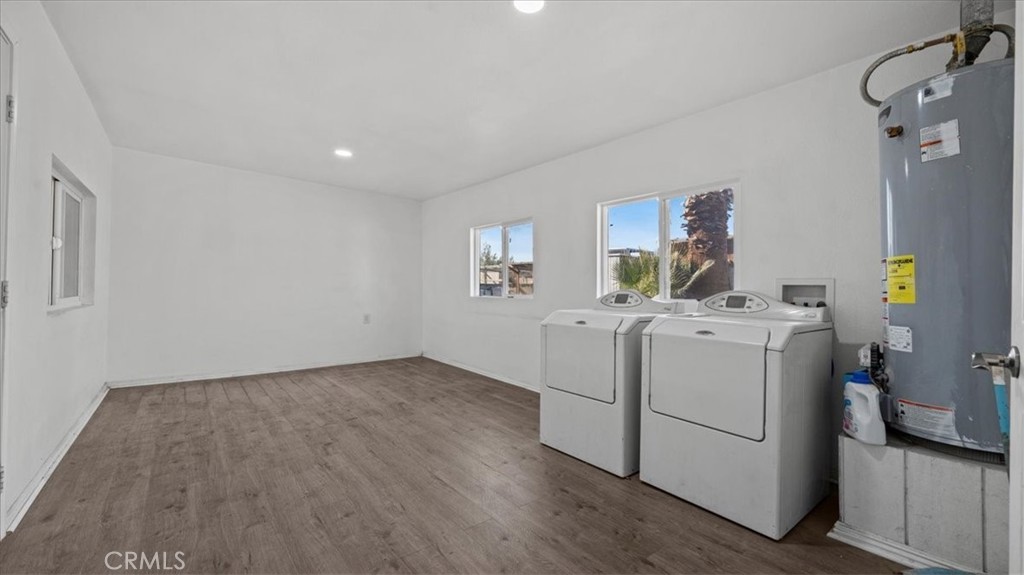 9728 East Avenue R Littlerock, CA 93543 - Photo 20 of 37 a view of storage and utility room with washer and dryer