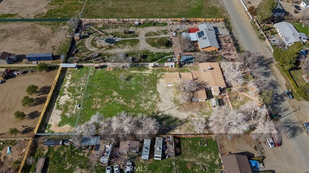 9728 East Avenue R Littlerock, CA 93543 - Photo 32 of 37 an aerial view of a house with a yard