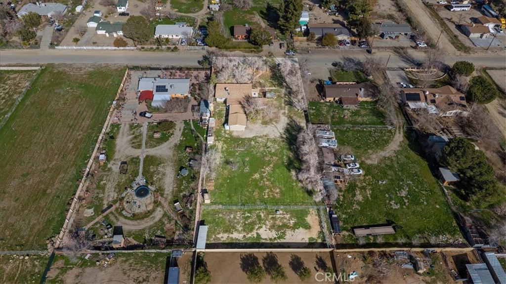 9728 East Avenue R Littlerock, CA 93543 - Photo 35 of 37 an aerial view of residential houses with outdoor space