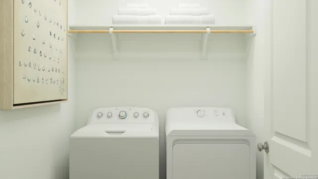 a utility room with dryer and washer