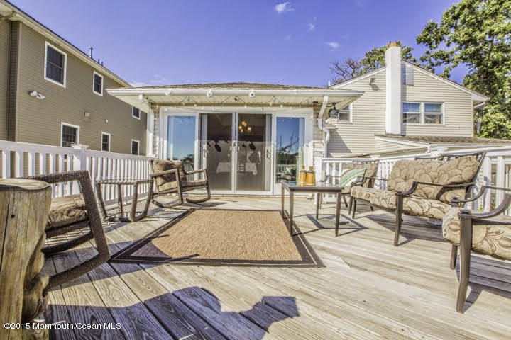 623 Bancroft Road Brick, NJ 08724 - Photo 14 of 91 a view of a house with barbeque and wooden floor