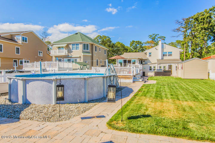 623 Bancroft Road Brick, NJ 08724 - Photo 3 of 91 a swimming pool with outdoor seating and yard
