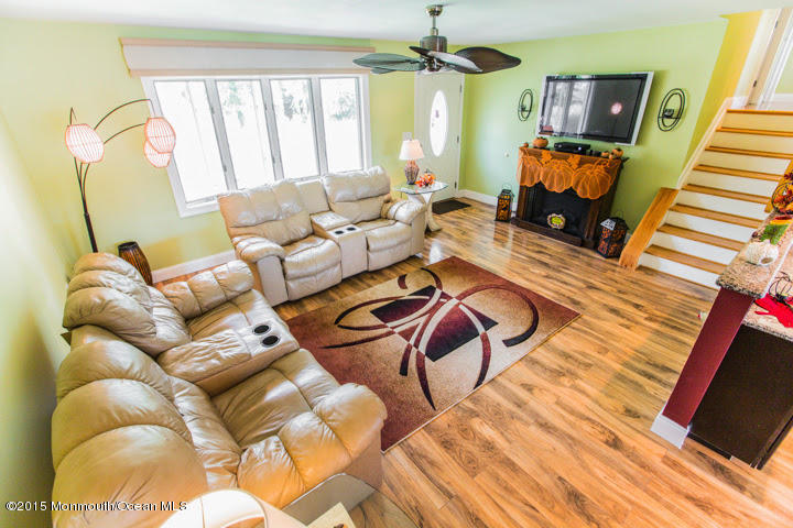623 Bancroft Road Brick, NJ 08724 - Photo 39 of 91 a living room with furniture and a flat screen tv