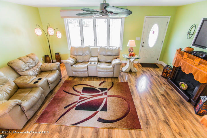 623 Bancroft Road Brick, NJ 08724 - Photo 41 of 91 a living room with furniture and a wooden floor