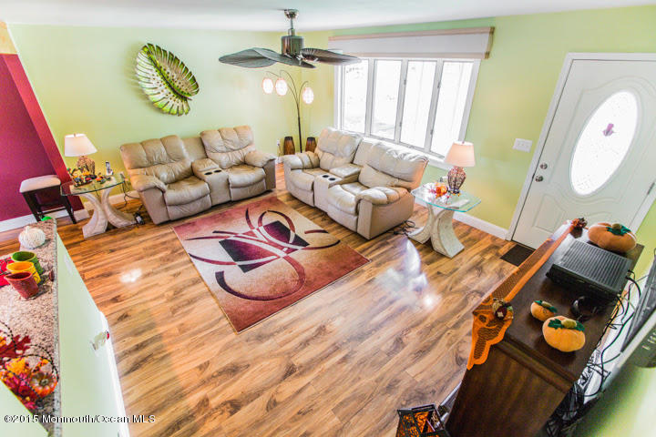 623 Bancroft Road Brick, NJ 08724 - Photo 5 of 91 a living room with furniture and a wooden floor