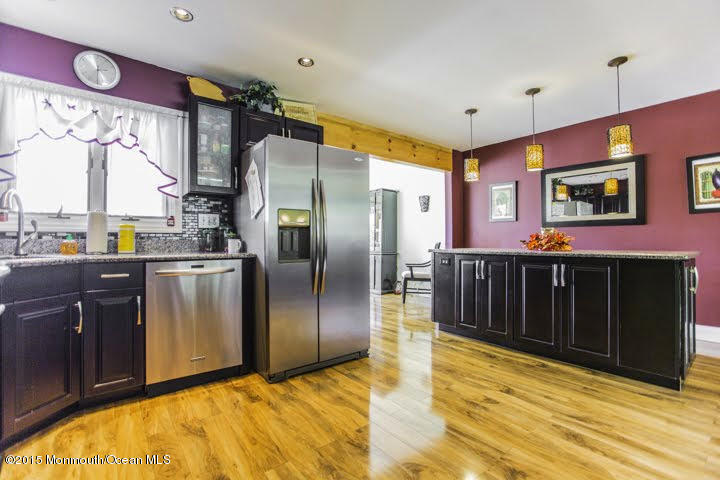 623 Bancroft Road Brick, NJ 08724 - Photo 58 of 91 a kitchen with stainless steel appliances granite countertop a refrigerator a sink and a stove
