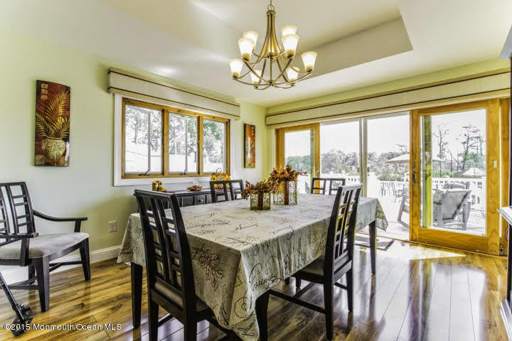 623 Bancroft Road Brick, NJ 08724 - Photo 61 of 91 a view of a dining room with furniture window and outside view