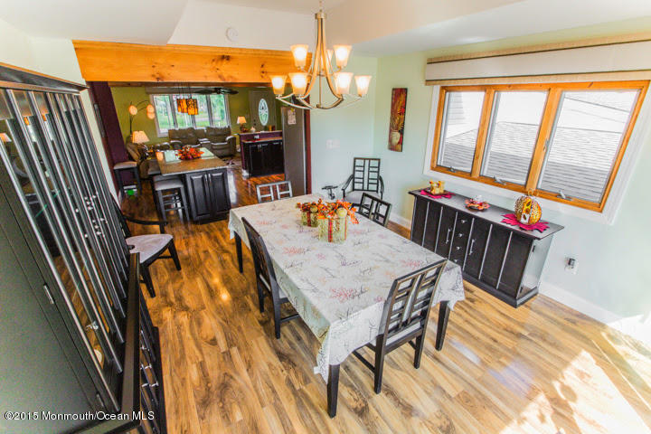 623 Bancroft Road Brick, NJ 08724 - Photo 65 of 91 a view of a dining room with furniture window and wooden floor
