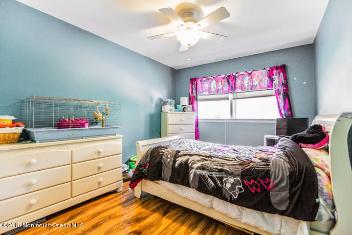 623 Bancroft Road Brick, NJ 08724 - Photo 72 of 91 a bedroom with a bed and a dresser in it