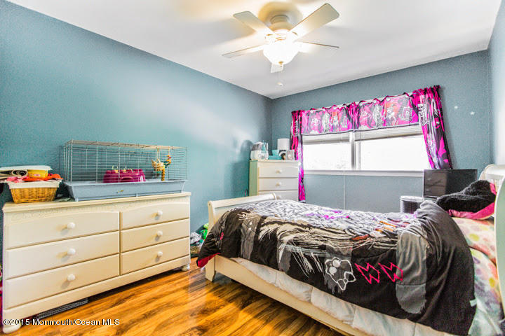 623 Bancroft Road Brick, NJ 08724 - Photo 73 of 91 a bedroom with a bed and a dresser in it