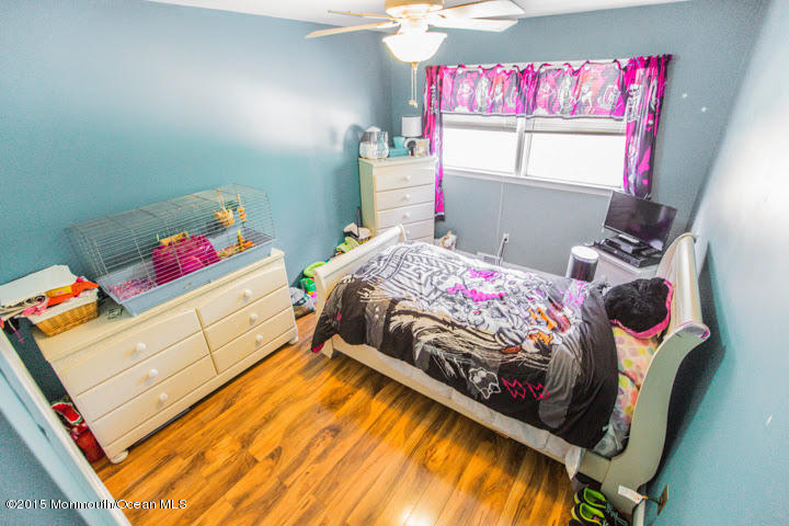 623 Bancroft Road Brick, NJ 08724 - Photo 74 of 91 a bedroom with a bed and dresser
