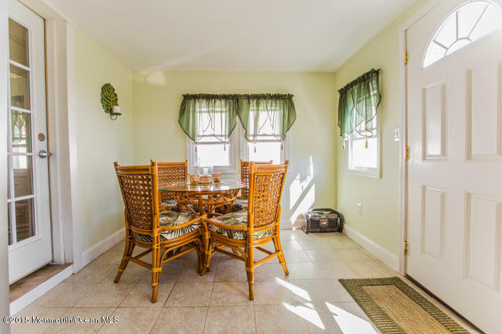 623 Bancroft Road Brick, NJ 08724 - Photo 89 of 91 a dining room with furniture and a window
