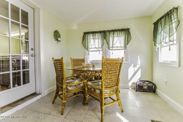 623 Bancroft Road Brick, NJ 08724 - Photo 90 of 91 a view of a dining room with furniture and a window