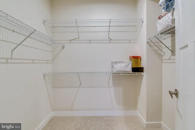 a view of a room with racks on the wall