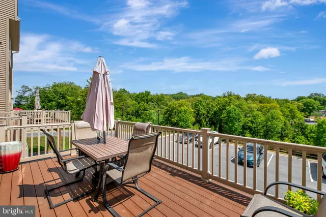 a view of a balcony with furniture