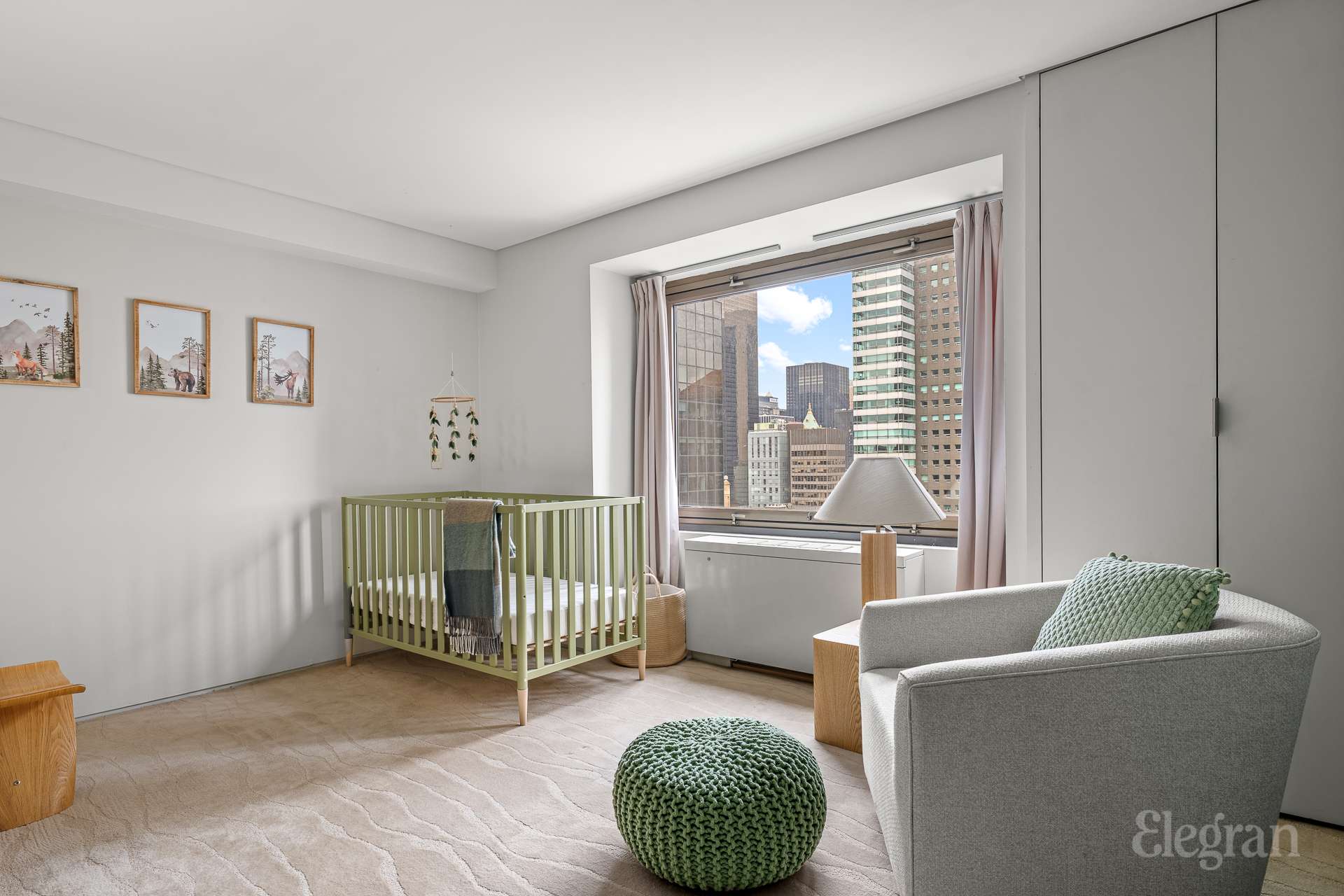 118 East 60th Street, Unit 33/32 DUPLEX Manhattan, NY 10022 - Photo 19 of 23 a living room with furniture and a window