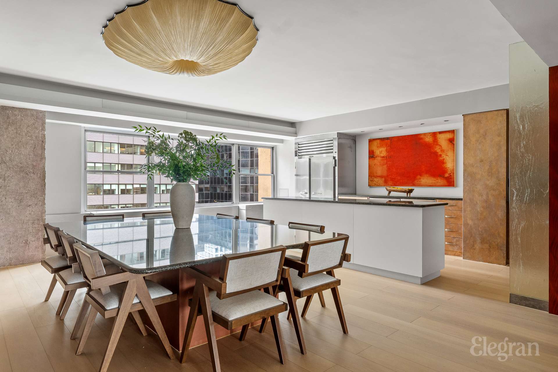 118 East 60th Street, Unit 33/32 DUPLEX Manhattan, NY 10022 - Photo 7 of 23 a dining room with furniture and window