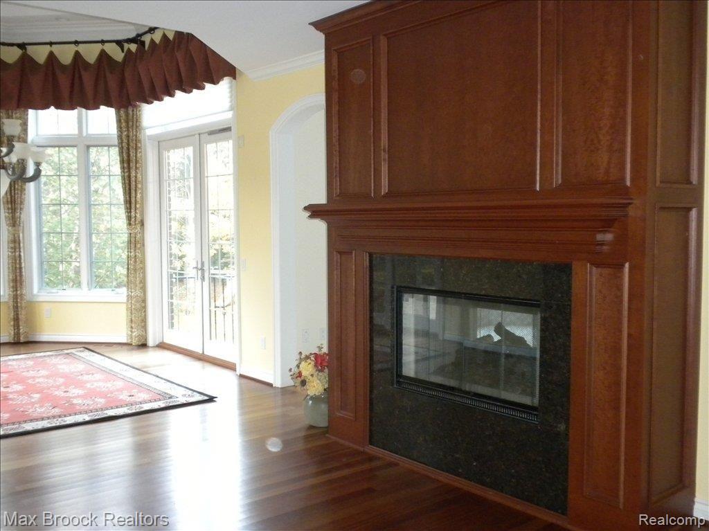 1701 Buell Court Rochester, MI 48306 - Photo 17 of 25 Fireplace in Kitchen